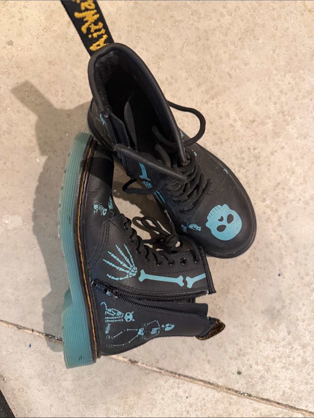 Dr. Martens Kids Black Boots teal accents, these glow in the dark!!!!